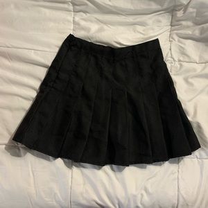 Black pleated skirt with built in shorts